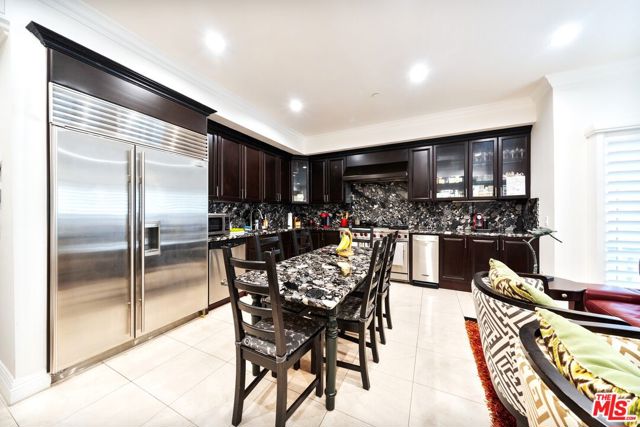 1043 S Kenmore Avenue, Los Angeles CA: https://media.crmls.org/mediaz/67de306a-cff8-47f8-a7c4-34d14c32f6c7.jpg