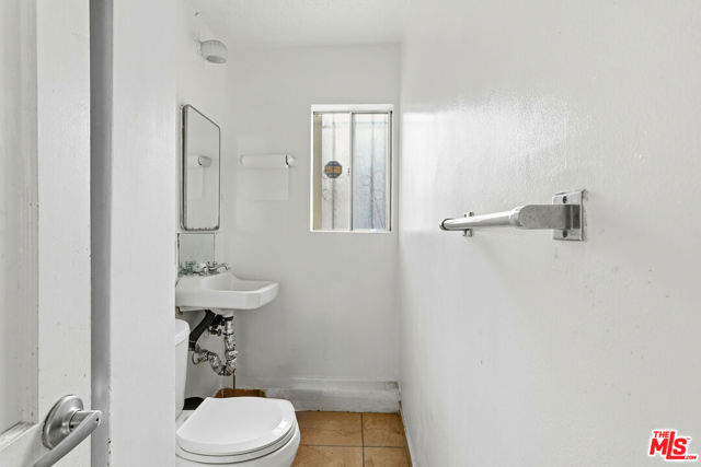 2048 W Florence Avenue, Los Angeles CA: https://media.crmls.org/mediaz/67e1eff1-8659-49bf-9b2f-c25bc9b01f2e.jpg