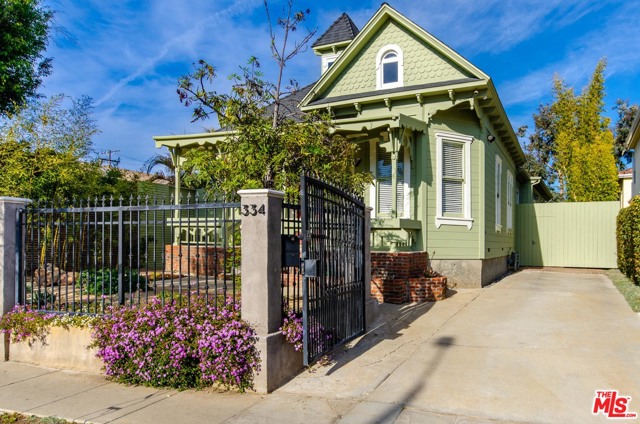 334 4Th Avenue Venice, California Welcome to the Venice home of your dreams-a peaceful retreat in a vibrant beach community! This classic Venice Victorian featured in Cheech & Chong's iconic movie Up in Smoke has been lovingly updated into a modern home, while respecting the home's true character. It has lots of natural light and benefits from healthy sea breezes and fresh air coming off the Pacific just 4 blocks away. The home features an open floor plan, 3 bedrooms downstairs, ample storage, central A/C, hardwood floors, stainless steel appliances, granite countertops and a cook's kitchen opening to the rear deck. The upstairs features the ultimate work-from-home space/ home gym/ yoga room/4th bedroom with views of the mountains. The home also features drought-resistant landscaping, drip irrigation, new exterior paint, custom gates and fences, an owned solar system as well as a charming workshop in the backyard. The convenient front-yard driveway is a rarity in beach communities. Walk to the beach, Abbot Kinney Boulevard, Whole Foods and enjoy area restaurants like Gjelina or Gjusta! Live the Venice lifestyle at its finest.