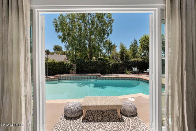 Primary bedroom to pool and spa