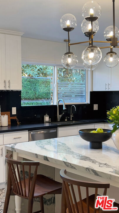 4427 S Wilton Place, Los Angeles CA: https://media.crmls.org/mediaz/68724576-f228-45f9-9c69-8c973a706632.jpg