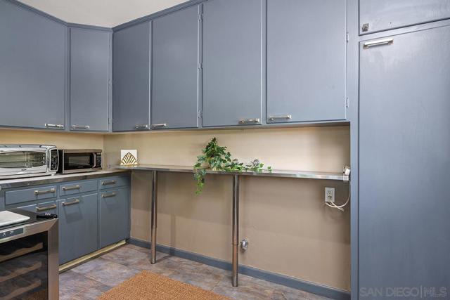 Additional cabinets, storage adjacent to the kitchen