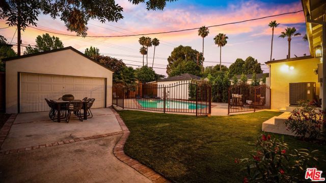 Backyard View (Long Driveway, Pool & Converted Garage)