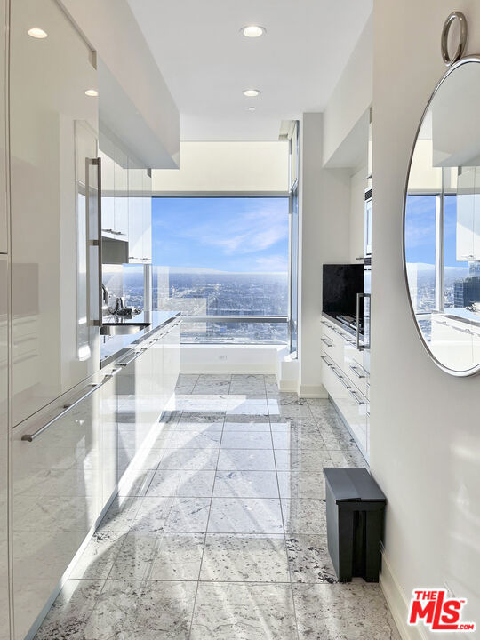 900 W Olympic Boulevard, Los Angeles CA: https://media.crmls.org/mediaz/69516837-e501-4b21-8773-dd3d532119be.jpg