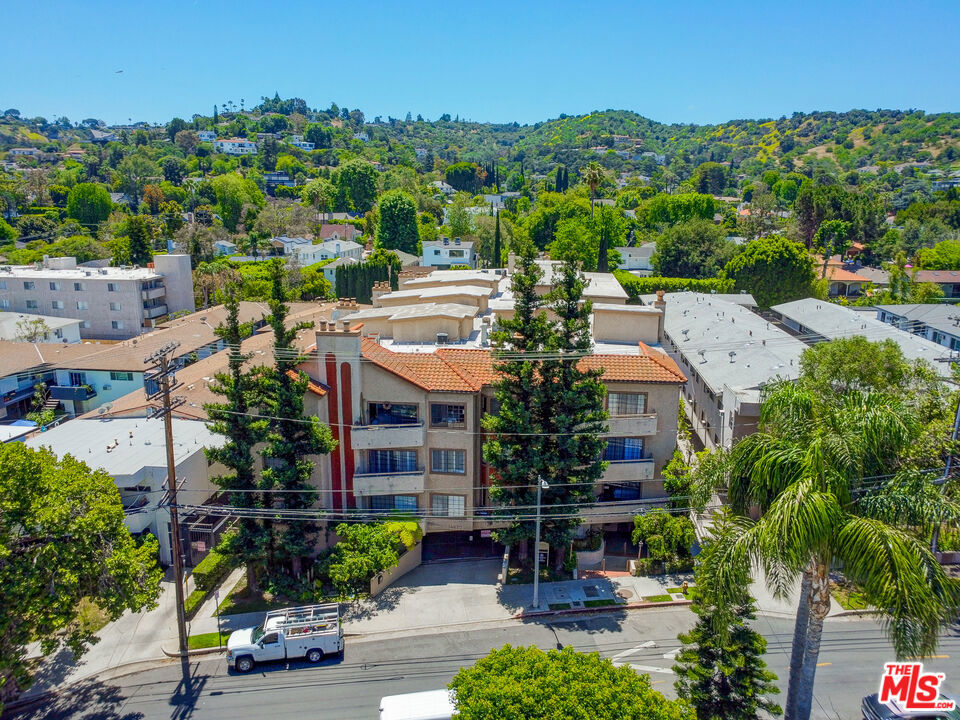14630 Dickens Street 102 Sherman Oaks, California Craving a fresh, modern space in the heart of Sherman Oaks? This newly remodeled condo offers relaxed luxury just moments from the vibrant shops and restaurants of Ventura Blvd. From the warm wood-style flooring to the crisp white palette throughout, every inch feels thoughtfully created. The kitchen features all the appliances you need with bar seating on one side and a casual breakfast nook on the other, ideal for both quick bites and leisurely mornings. An open dining area framed by a row of street-facing windows flows into the living room with built-in cabinetry, a fireplace, and a wet bar for entertaining. Slide open the glass door to your private balcony for morning coffee or evening sunsets. Two bedrooms and two bathrooms provide comfort and space, including a main suite with dual sinks, soaking tub, and a separate shower. Enjoy resort-inspired living with a community pool, all in an ideal location you can't go wrong with. Ready to live where style meets convenience?