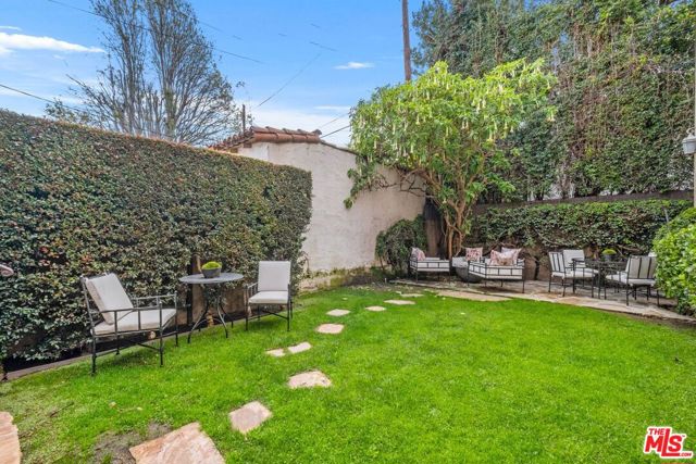 Private garden with sitting  dining area