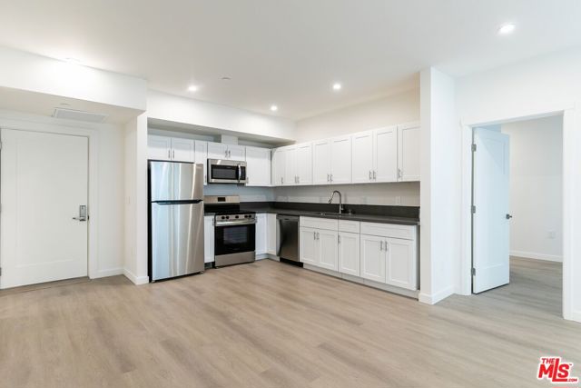 1227 N Berendo Street, Los Angeles CA: https://media.crmls.org/mediaz/69f856fd-8e32-4f42-801e-22f0b4e2e29b.jpg