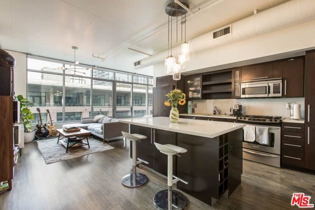 1100 S Hope Street 1313 Los Angeles, California Nestled inside the LUMA building in the Southpark district, this Northeast facing unit offers beautiful city views and exceptional loft living in DTLA. Luma is a LEED-certified green building that reduces energy use. Unit 1313 features refinished wood floors, remote control window shades, ice-stone countertops, and a newly remodeled bathroom with increased closet space. A recently added kitchen island acts as an ideal dining station as well as a home-work area. Tenants also benefit from high ceilings, lots of natural light, Central AC, and in-unit laundry. Building amenities include concierge, 24hr security, gym, subterranean parking, a spacious outdoor lounge area featuring a pool, spa, sundeck, bbq area, and fireplace. Local amenities include Prank Bar, Hygge Bakery, Broken English, Barcito, Nimbus Coffee, Orange Theory Fitness, Soul Cycle, and Whole Foods. Just minutes from Staples Ctr, LA Live, and Ritz-Carlton.