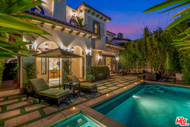 205 S La Peer Drive Beverly Hills, California Stunning Transitional Masterpiece in South Beverly Hills. This extravagant 2013 home features a resort like pool, spa and backyard area perfectly manicured for todays buyer. Formal LR includes adjoining office w/marble fp & steel grated window coverings. FR features wood beams, striking stone fp & floor to ceiling French doors which overlook manicured grounds. Chef's kitchen boasts 9' island & Viking appliances surrounded by glass doors leading to patio & pool. Upstairs showcases a large main suite w/French doors, walk-in closet, fire place & balcony & 3 en-suite bedrooms. Lower level has media screening rm w/bar & wine cooler.