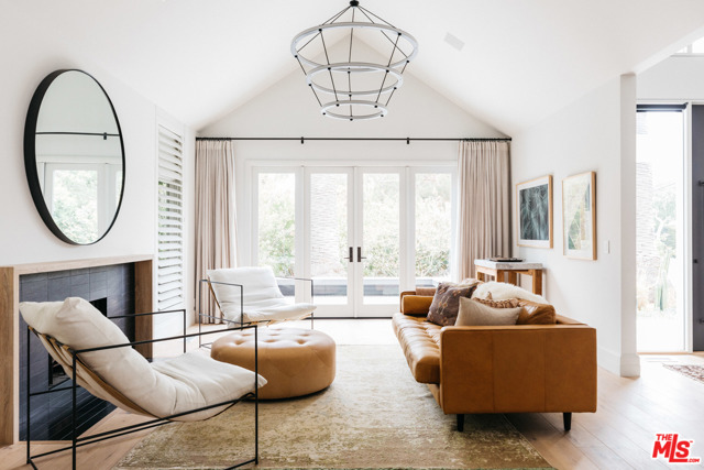 1002 Alta Avenue Santa Monica, California Nestled on a desirable corner lot just north of Montana, this home boasts complete privacy in prime Santa Monica. 15-minute walk to the beach & a block from restaurants & boutiques. This Scandinavian-inspired modern farmhouse is a true sanctuary. Sellers invested generously in a full renovation (down to the studs) & adorned the home with the finest finishes. The functional design was re-imagined by renowned architectural firm, Abramson Architects. The main living and entertaining spaces sit between a beautiful courtyard and lush private backyard. Massive windows and French doors throughout connect the home to the outdoors seamlessly. The entire property is adorned with mature palm and sycamore trees, creating gorgeous views throughout the house. Ample built-in storage, several seating areas for al-fresco dining, and generous ceiling height creates scale and volume, making for a functional environment. Duchateau oak wood and Cle cement tiles elegantly line the floor throughout. The kitchen features custom floor-to-ceiling cabinetry, all new Miele appliances including a built-in coffee maker and two dishwashers, making the main floor an entertainer/chef's dream.