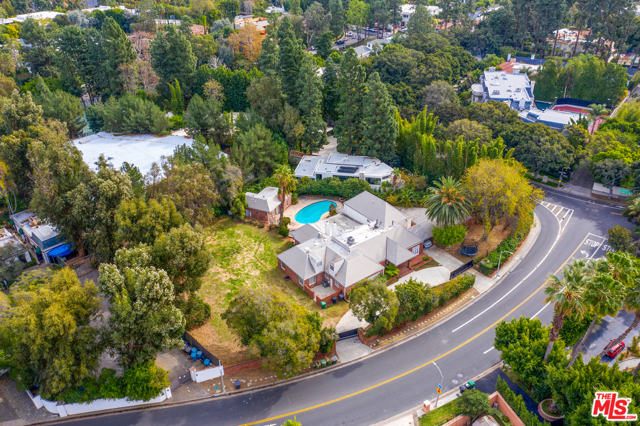 1012 N Beverly Drive Beverly Hills, California One of the largest lots on the market North of Sunset! This one-of-a-kind 5 bedroom, 8.5 bath, 2 story Gated French Provincial home exudes charm and an abundance of space. The home provides a formal dining room that connects to a chef's kitchen. The living & family rooms feature spectacular fireplaces and the master bedroom has his & hers baths and a connecting dry sauna. The home also offers separate maid's quarters with both a bath and laundry room. The gorgeous home also has a pool, spa and cabana with bath. This double gated house features a circular driveway, 2 car garage & a carport. Don't miss this opportunity!