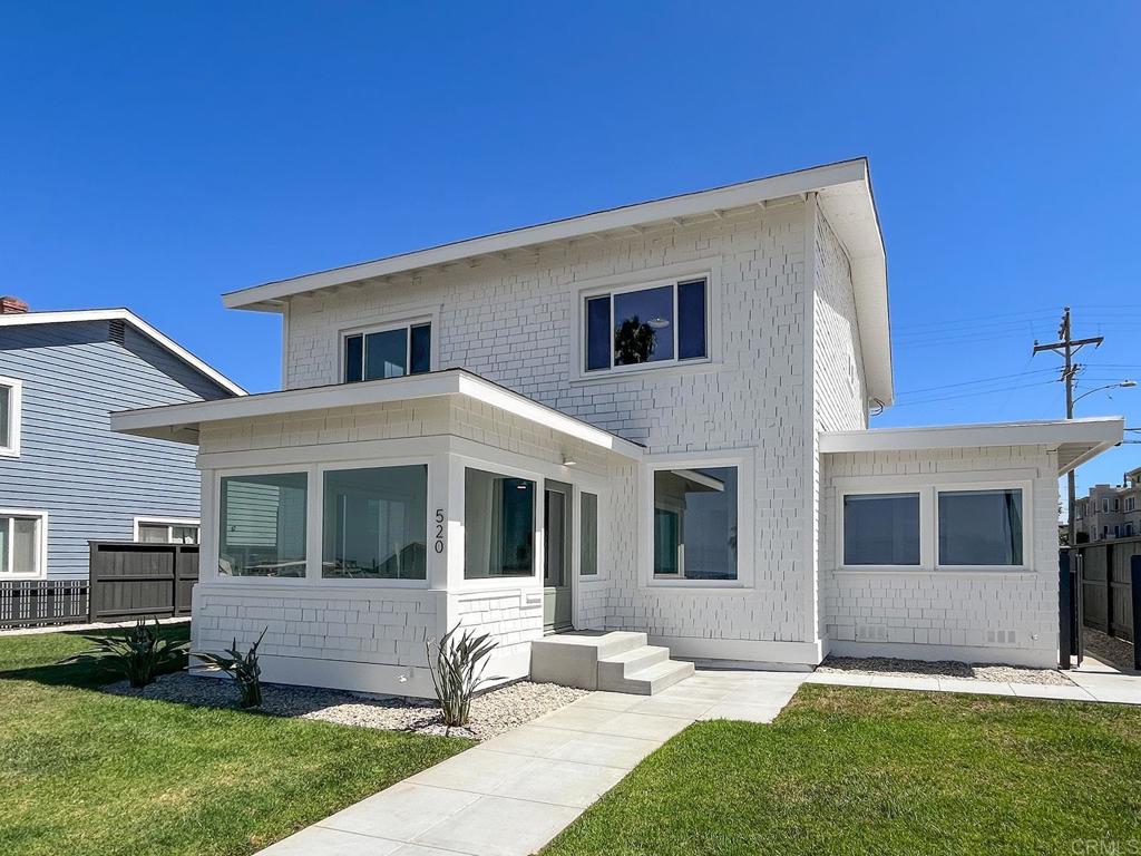 Oceanside's finest historical home, built in 1913, ocean views from sun room, living room and primary bedroom.  Formal dining room entices holiday dinners and great memories. A 1920's kitchen in pristine condition. Laminate flooring, floor to ceiling cabinetry, and newly completed upgrades make this kitchen one worth creating meals and memories. Three rooms downstairs great for a library, study, or bedroom. Bedrooms upstairs are a nice size and create a warm feeling. The primary bedroom spans the entire top floor and overlooks the ocean and pier. The primary bedroom is perfect for relaxing and watching amazing sunsets! A neatly manicured yard surrounds the home. Also, a detached, two car garage has a separate office for even more space or storage! Truly a must see!