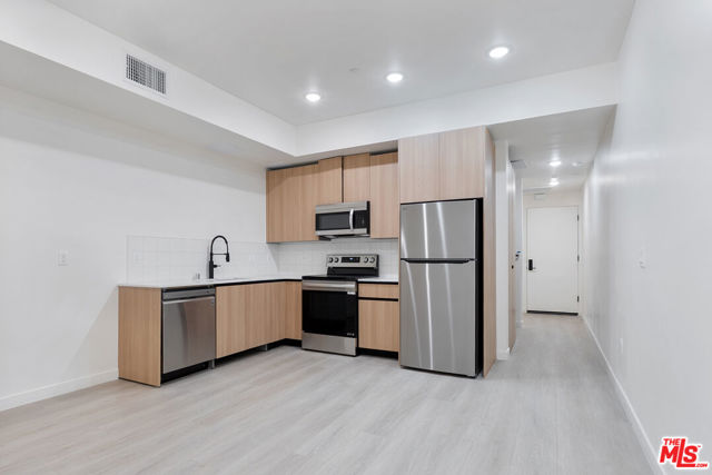 1124 S Normandie Avenue, Los Angeles CA: https://media.crmls.org/mediaz/6a4e243b-0405-49d7-9492-ed63c546a160.jpg