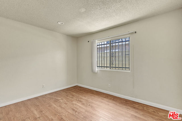 433 E 97th Street, Los Angeles CA: https://media.crmls.org/mediaz/6aa0fb76-236c-4f18-b8ea-a13da23c29dc.jpg