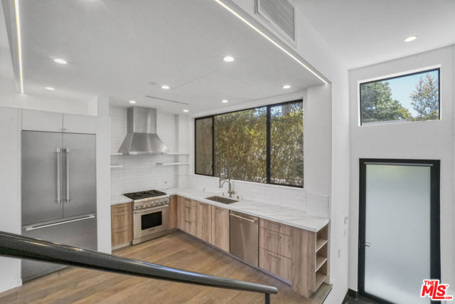 1445 1/4 N Martel Avenue, Los Angeles CA: https://media.crmls.org/mediaz/6ad1ce0f-f326-4f95-a2d7-0e5a8a94cb9c.jpg
