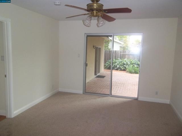 Steps out to large covered Brick Patio