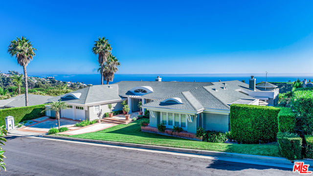Unquestionably, one of the best view lots in the highly-coveted Pacific View Estates neighborhood.  Move right in, or use your creativity to re-imagine this unique estate site.  With 3 bedrooms and 3 bathrooms, and over 4,900 square feet, this home is big-boned, and situated on a prime, expansive ocean view lot. The possibilities abound. Centrally located within easy reach of Malibu, Pacific Palisades and Santa Monica.