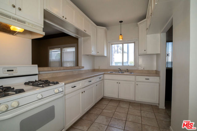 5700 Cimarron Street, Los Angeles CA: https://media.crmls.org/mediaz/6c04df6c-2c63-48db-8702-0a0395f7825e.jpg