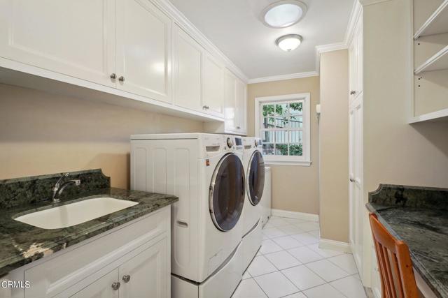 Laundry with custom cabinets