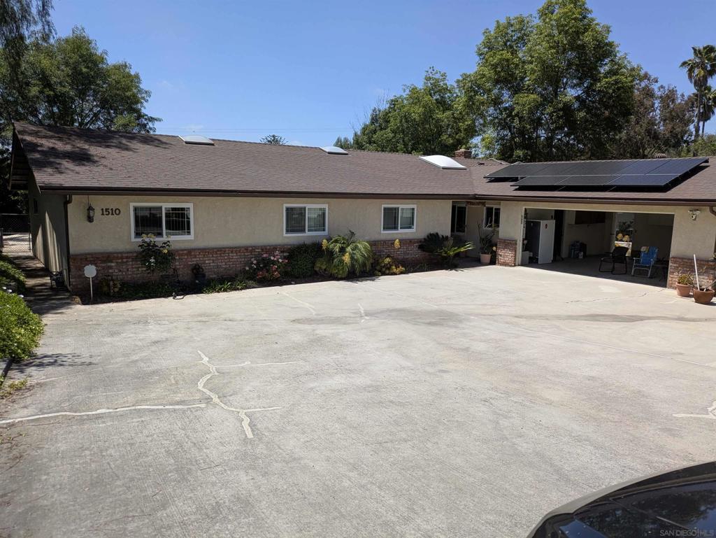 1510 Sunrise Dr Vista, California Look at all the room. Sitting on a 1/2 acre lot this spacious home has newer paint and newer flooring. Fireplace in the family room. Modern appliances in the kitchen. Each bedroom gets natural light. There is a covered patio that adjoins the pool. Partially fenced and the whole lot is accessible for hiking. Solar panels help defray electrical costs. Oversized double car garage has room for storage.