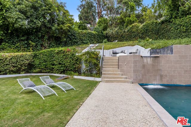 8056 Mulholland Drive, Los Angeles, California 90046, 3 Bedrooms Bedrooms, ,3 BathroomsBathrooms,Single Family Residence,For Sale,Mulholland,24401067