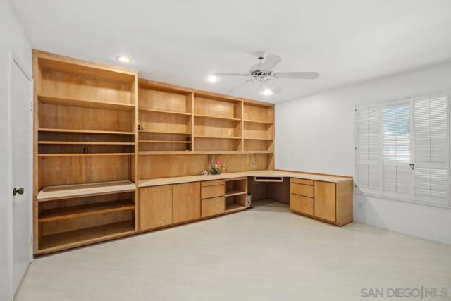 Second Bedroom with built-in desk and bookcases, could also be used as a den or office.