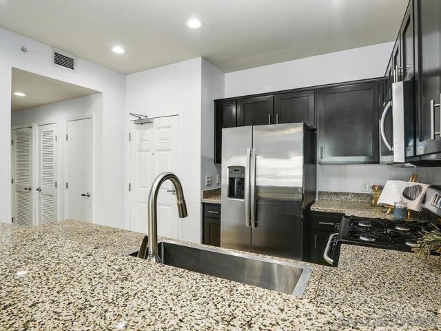 450 J St, San Diego CA: https://media.crmls.org/mediaz/6d8c0465-3788-43ec-8345-dc842b151881.jpg