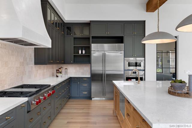 Gorgeous, custom designed kitchen with large walk-in pantry.