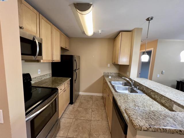 Image 7 of 38 For 6400 Christie Ave  5211