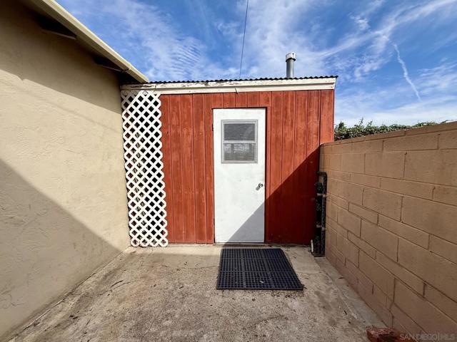 Outdoor shed with laundry hookups