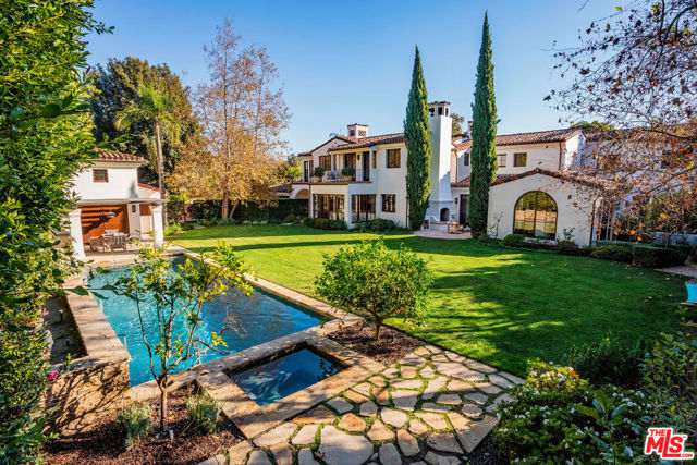 Come marvel at this 6-bed and 9-bath Montecito-style equestrian estate built in 2007 with impeccable attention to detail and finishes and located in a quiet cul-de-sac in highly desirable Sullivan Canyon. The large flat 27,533 sq ft corner lot with a 10,332 sq ft home lies hidden behind private wooden gates, ideal for entertaining and privacy. Recent $500,000 updates include a new movie theater, a spacious 767-bottle wine room, and a full bar. The detached gym has a new infrared Jacuzzi sauna and an adjacent new basketball half-court. Additional recent upgrades include new drapes, AC units, and pool heater. In the main house, experience rich hardwood flooring and wood-beamed ceilings leading to the formal living room and fireplace. The first floor features a dining room, media room with bar, guest suite, maid quarters, and a home office with fireplace. True chef's kitchen complete with Viking appliances, custom cabinetry, oversized island, butler's pantry, and separate walk-in pantry. The 2nd level has four ensuite bedrooms, including the spa-like primary suite with his and hers closets. The backyard features a gorgeous pool, a jacuzzi, and a stable (currently used as a gym). Outdoor BBQ with dining space showcases Brentwood living at its best. This smart home is fully integrated with Control 4, top-of-the-line Qolsys, and Optex surveillance systems. Ideally situated near the Sullivan Canyon riding ring and the Santa Monica Mountain trails, this warm, inviting home represents a rare offering in prime Sullivan Canyon. The property is zoned for horses. A true retreat!