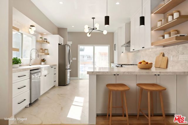 1558 W 47th Street, Los Angeles CA: https://media.crmls.org/mediaz/6fcb1d94-8853-44d2-b529-a3b06e5a8999.jpg