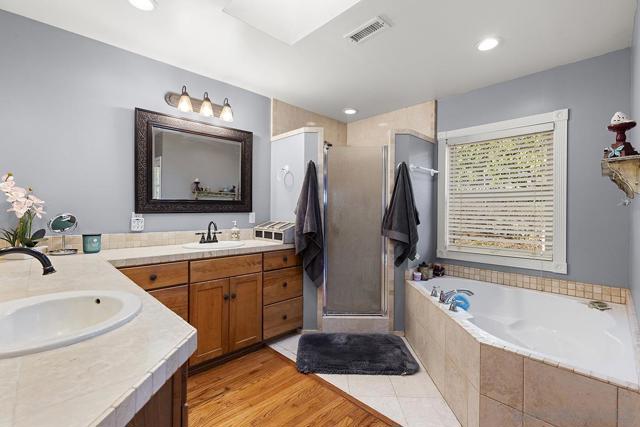 bath with a huge soaking tub