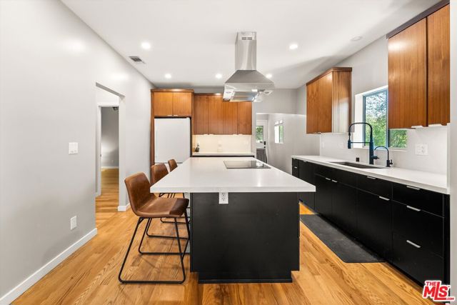 1404 N Hoover Street, Los Angeles CA: https://media.crmls.org/mediaz/70af0677-52f2-446d-8709-513c1f16750f.jpg