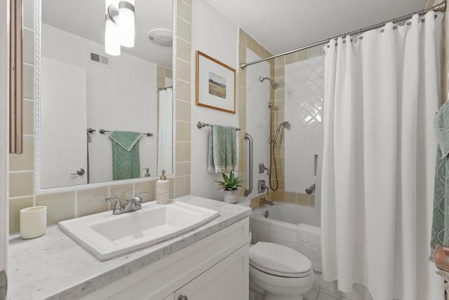 6887 Carnation Drive, Carlsbad CA: https://media.crmls.org/mediaz/70c8623d-1c88-445e-bad2-c4d18bdc0037.jpg