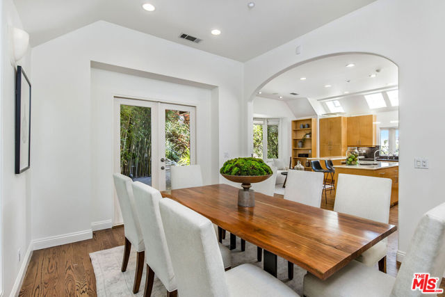 Arched Dining and French Doors to Patio