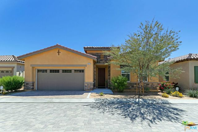4447 Via Del Pellegrino Palm Desert, California Welcome to Villa Portofino. This gorgeous designer done and highly upgraded home features, 3 bedrooms, 3 baths plus a den. This detached home built in 2016 is the largest model in the complex. The gourmet kitchen features a large center island with quartz counter tops, two ovens and stainless appliances. The open floor plan is perfect for intimate dinners or large gatherings. The primary suite features a walk-in closet and spa like bath with dual vanities, large shower and soaking tub. Enjoy the gorgeous mountain views from the patio. Villa Portofino is an over 55 community with many amenities that include a clubhouse, movie theater, fitness center, game and meeting rooms, huge pool and spa and a restaurant. HOA dues include basic cable and internet. This is the home and lifestyle you have been looking for!