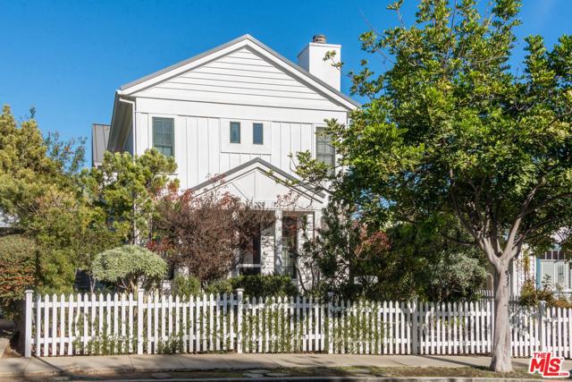 1229 22nd Street Santa Monica, California Unique Cape Cod duplex by noted architect David Hibbert (2008 NRG-effic.custom build). Residence A @front behind picket fence w/ garden, formal brick entry; open liv/din. area w/marble fp/handcarved mantel & designer kitch. w/ black granite counters, SS app/custom cabinetry, bath powder rm. 2nd story up Jarrah stairs match hardwood floors throughout. Laundry area upstairs, 2 bedrooms, each w/full marble baths. Res. B set back w/ private fence/entry, priv. garden w trees, deck & brick entry into open plan lr/dr and elegant marble kitchen and pantry. Full bath & 2 story lib. off LR w/sep. entrance; dramatic 2 sty stairs in Jarrah match hardwood floors throughout. 2nd fl. priv. entry Master BR w/marble bath, fp and private deck. 2 family bedrooms w/Jack&Jill bath + office alcove atop stair landing complete floor 2. Direct entry garage, 220V EV charging. Units fully wired for sec. Wifi, media., plantation shutters thruout.