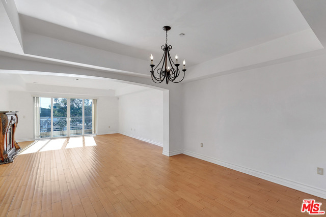 1530 S Centinela Avenue 302 Los Angeles, California This stunning condo in Sawtelle / West LA will be your sanctuary of calm and spaciousness from the moment you enter. With three bedrooms and three bathrooms, there's room for everyone to feel cozy and have a space of their own. The massive open plan living room greets you with a bright airy feel as the light streams in through the sliding glass doors that lead to your private balcony. With enough room for a serene place to relax in front of the ornate fireplace AND have space for a large dining area, this unit is ready to host your friends and family when the time is right. A gorgeous kitchen with a cut out to the dining and living space allows you to engage with the rest of the unit while you prepare a meal on your stainless-steel gas range and oven, or put the days dishes into the matching stainless-steel dishwasher. There's a microwave and fridge to boot, completing the updated look of this lovely kitchen. Each bedroom features bright, airy windows and plenty of closet storage, and luxurious carpet to keep you comfortable. And each of the three bathrooms features beautiful Mediterranean tile to warm up the space where you pamper yourself. Includes a stacked washer/dryer. And two subterranean parking spaces means you'll always have a parking spot!