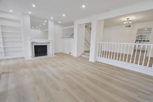 Light & Bright Day or Night!  FAB Natural Light + Generous Recessed Lighting.  Gas Fireplace.