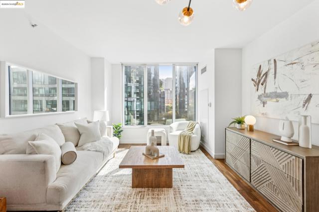 Living room with wood finished floors and baseboards