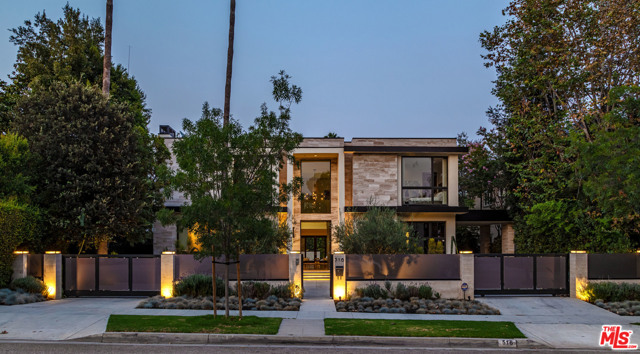 516 N Rexford Drive Beverly Hills, California Located in The Flats of Beverly Hills you will find this contemporary home that is a work of outstanding artistry. Offering apx. 6,600 sqft. of living space with epic scale, incredible volume, & the finest quality finishes. The property has a unique Rocky Mountain Travertine facade and a huge driveway which can accommodate up to 7 cars simultaneously. When entering you will feel the seamless flow of the home which is perfect for entertaining and family gatherings. Grand office with en-suite bathroom on the first floor which is perfect for working from home. Connected to the living area is also a state of the art kitchen with an oversized pantry. Upstairs you will find 3 en-suite bedrooms + a grand master bedroom combined with his/hers walk in closets and an extravagant bathroom with vintage Versace tiles, as well as an oversized balcony offering great privacy. Entering the backyard you will find a saltwater pool/jacuzzi and a guest house with a private bathroom. Control 4 Smart System.