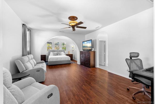 Primary bedroom suite entry with sitting area