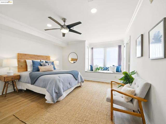 Bedroom featuring ornamental molding, recessed lighting, wood finished floors, and a ceiling fan