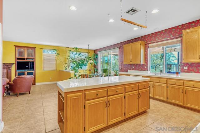 10496 Chaparral Dr, Santee CA: https://media.crmls.org/mediaz/737675aa-6e95-4524-a9c4-f355a6c16b0d.jpg