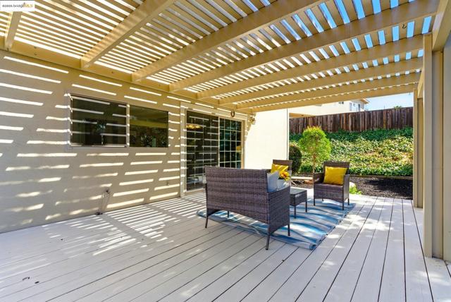 Deck featuring a pergola