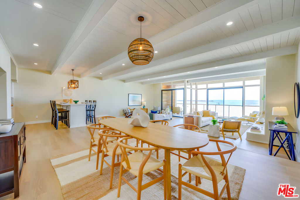 Located on the best beach in LA in a spectacular, well-maintained building, this gorgeous oceanfront residence is a true coastal gem, offering the most incredible width and panoramic ocean views up and down the coast! The heart of this home lies in its expansive grand space: the living area that seamlessly flows into the dining space and gourmet kitchen, highlighted by an open floor plan, high ceilings, and wall-to-wall, floor-to-ceiling glass that showcase the abundance of natural light and mesmerizing ocean views. The private oceanfront balcony, beautifully accented with wood trim, offers the perfect vantage point to soak in the breathtaking views, indulge in al fresco dining, or simply relax and unwind to soothing ocean sounds, fresh air, and stunning sunsets. The primary bedroom suite features ample closet space, private outdoor space, and en-suite bathroom with a walk-in shower and dual sink vanity. The second bedroom feels like an additional primary, complete with a walk-in closet and en-suite bathroom with a luxurious jetted soaking tub. This beachfront retreat is fully renovated with hardwood floors and high-end finishes throughout. Mostly on one level with only a few steps to the living room. Includes 3-car parking and private storage. Situated on the highly coveted Marina Peninsula, this home provides an oasis with easy access to the beach and nearby upscale dining, shopping, and entertainment!