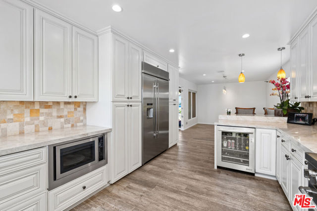 21727 Ulmus Drive, Woodland Hills CA: https://media.crmls.org/mediaz/742bd821-27e9-492a-a10c-ecb434649cd3.jpg