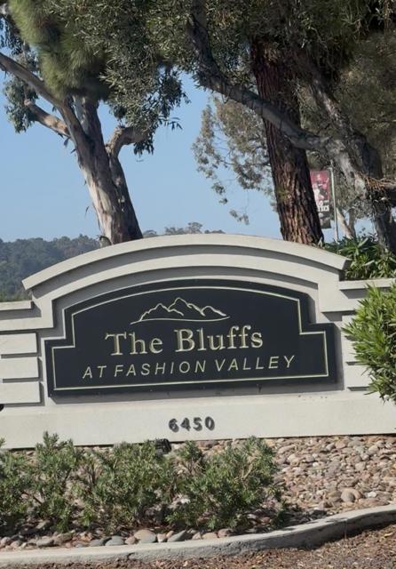 Easternmost entrance of Friars Rd into parking lot. Sign 