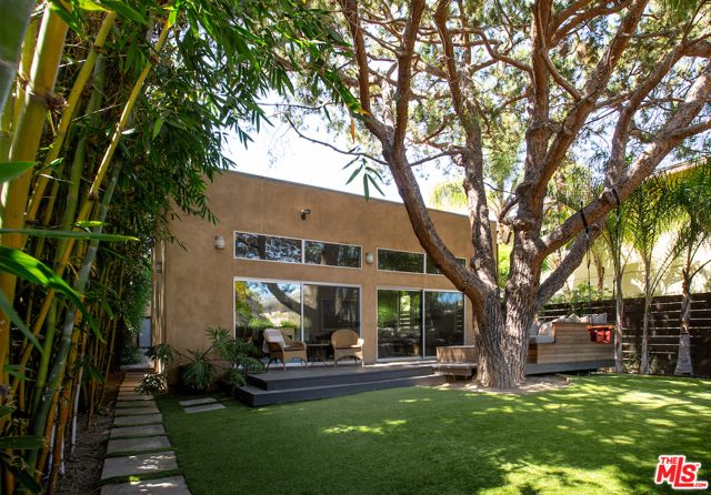 639 Vernon Avenue Venice, California Inspiring private gated Venice home close to Abbot Kinney, Main Street, and the beach! This reimagined modern gem is perfect for entertaining or a quiet retreat. Lush landscaping welcomes you home to a seamless sun filled indoor outdoor lifestyle that features soaring 12' high ceilings, hardwood flooring throughout, floor to ceiling windows, private yard and patios, and an al fresco dining area. The gorgeous contemporary kitchen features Calacatta marble counters, and top of the line Viking and Sub Zero appliances. A wall of windows and sliding doors opens to a deck with built-in bench seating and fire pit for relaxing evenings under the stars. Three spacious bedrooms include a master with private patio. Stunning bathrooms are Italian designed with dual vanity and Walker Zanger tile. Additional features include: Central HVAC, tankless water heater, and reverse osmosis drinking water filtration system, and access through your own gates to a two car garage or ample driveway parking